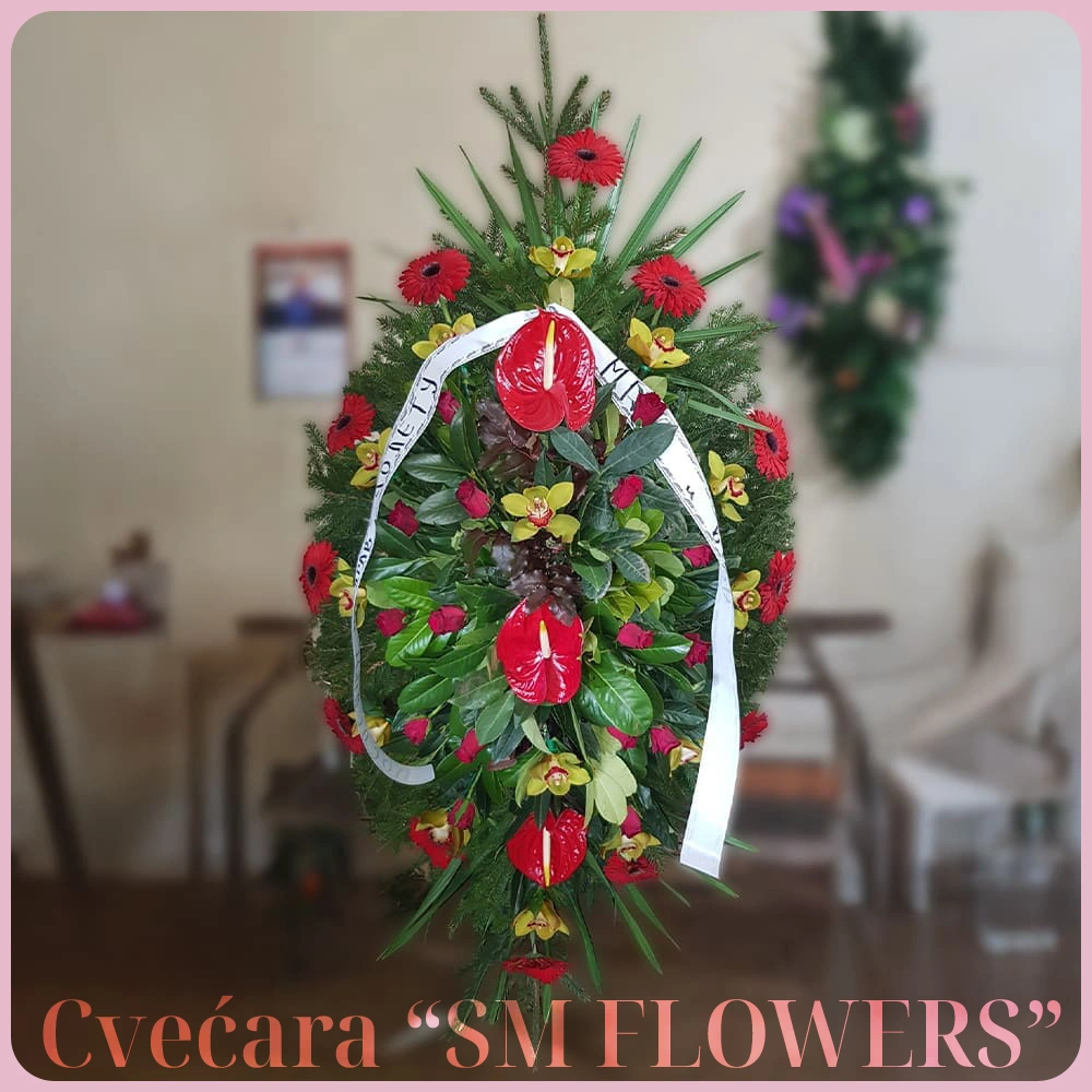 crveni anturijum zelena orkideja i crveni gerber venac za groblje