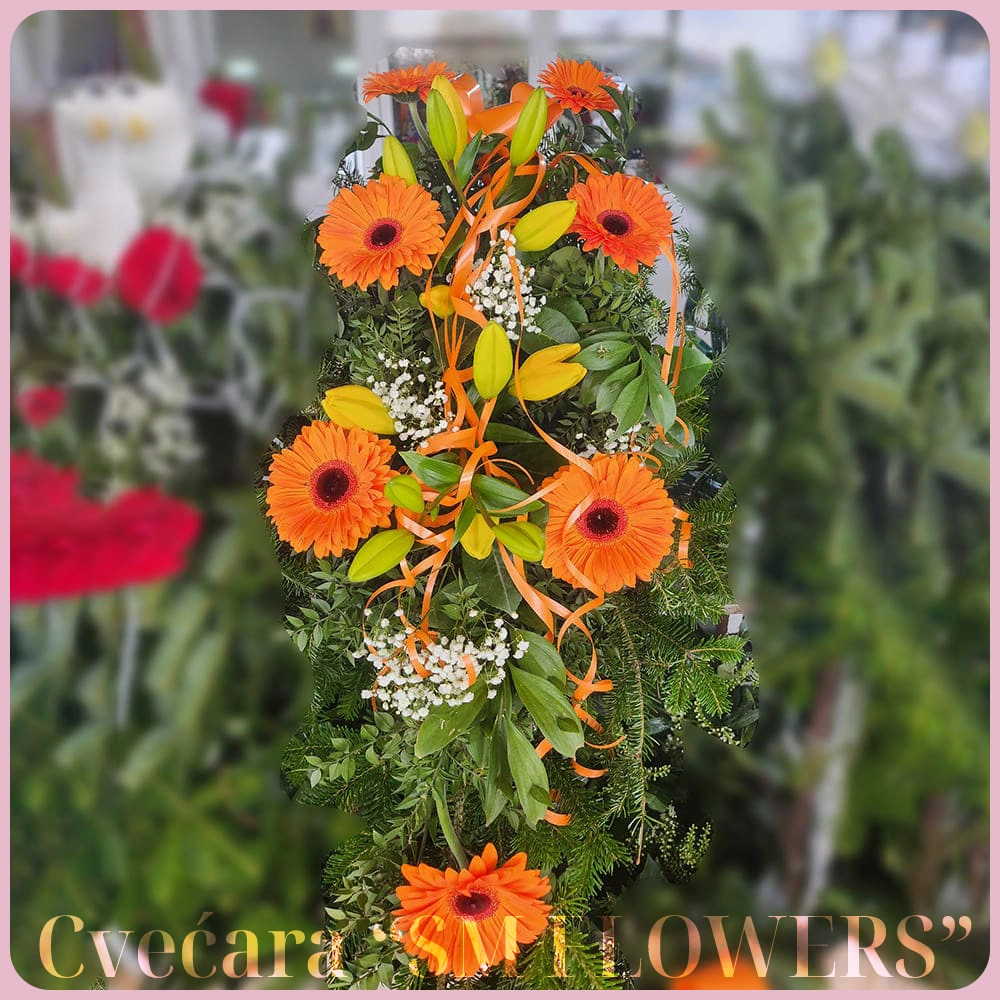 narandzasti gerberi i zuti ljiljani u pupoljku suza za groblje