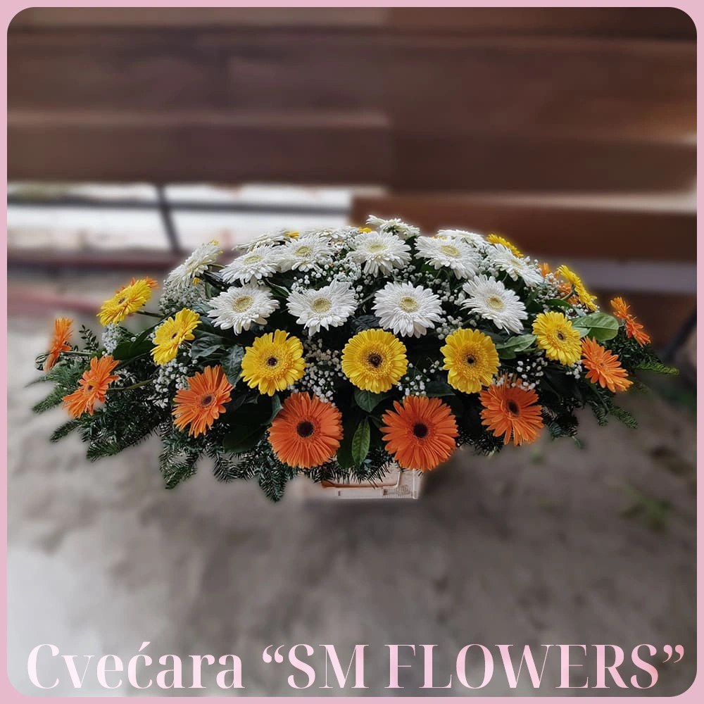 narandzasti gerberi i zuti ljiljani u pupoljku suza za kovceg