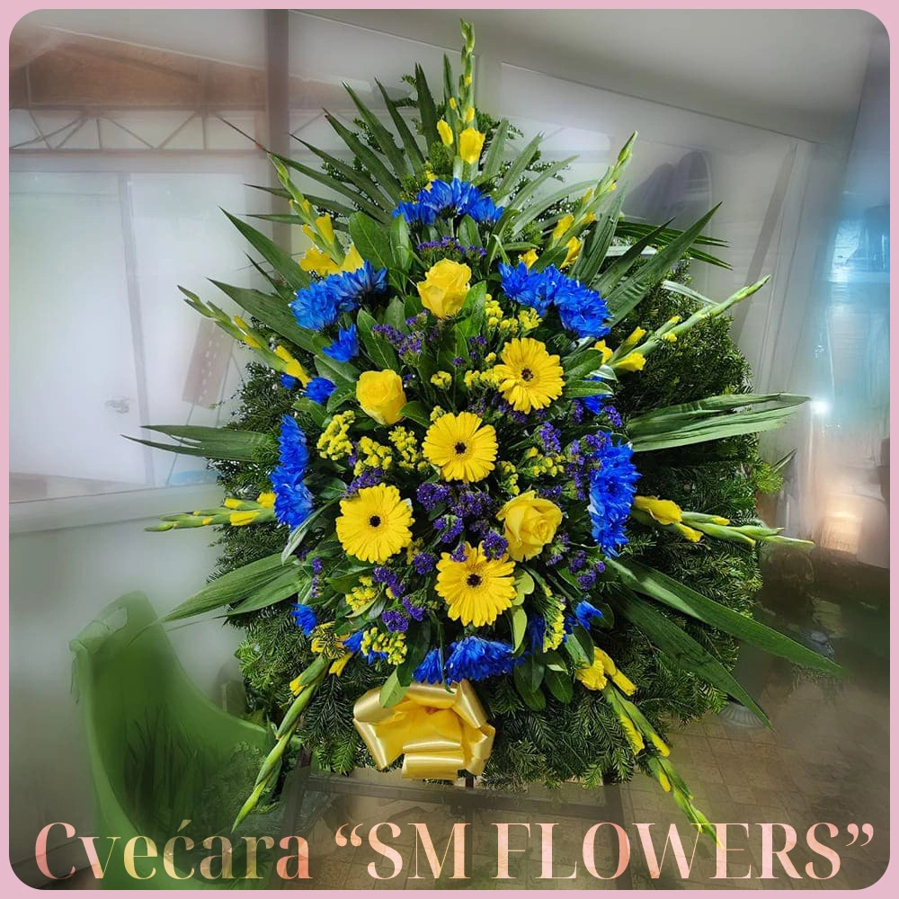 zuti gerberi zute ruze i plave hrizanteme venac za groblje